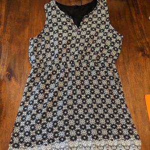 Black sleeveless dress with print
